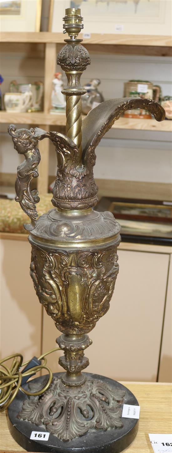 A large gilt cast metal Florentine style ewer table lamp